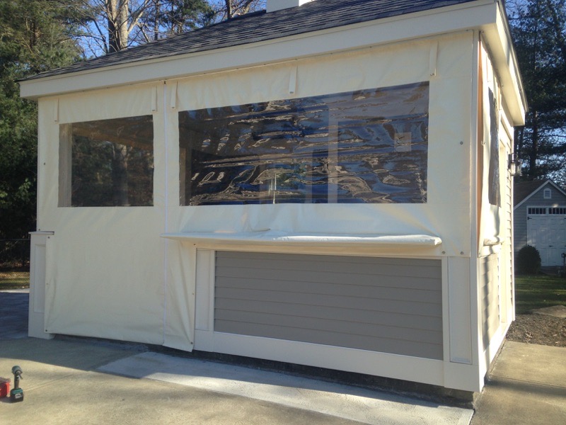 custom fitted drop curtain enclosure for out building at Boston MA home